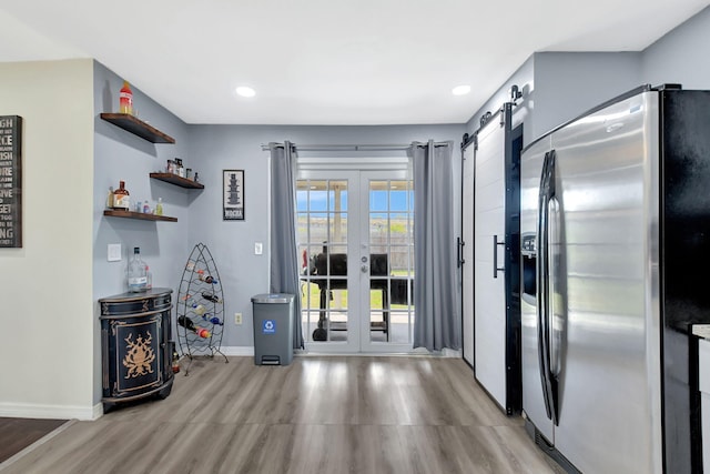 7938 Ridgewood Dr, Lake Worth, FL 33467 - interior space featuring light wood-style floors, french doors, baseboards, and recessed lighting