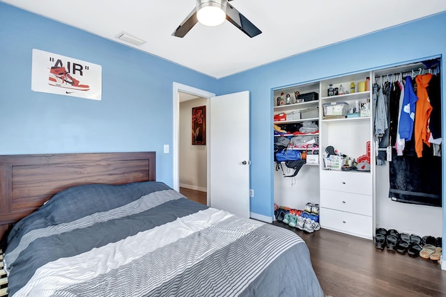 7938 Ridgewood Dr, Lake Worth, FL 33467 - bedroom with ceiling fan, a closet, visible vents, wood finished floors, and baseboards