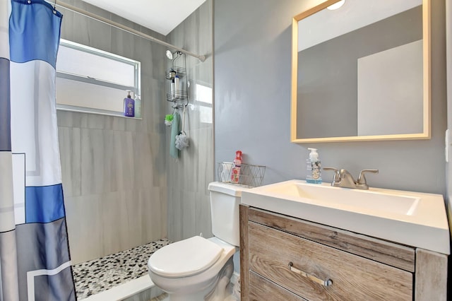 7938 Ridgewood Dr, Lake Worth, FL 33467 - full bathroom featuring a tile shower, vanity, and toilet
