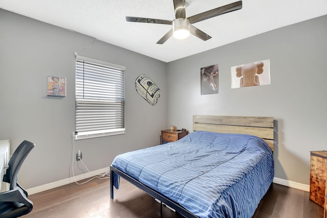 7938 Ridgewood Dr, Lake Worth, FL 33467 - bedroom featuring wood finished floors, baseboards, and a ceiling fan