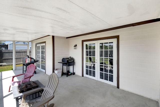7938 Ridgewood Dr, Lake Worth, FL 33467 - view of patio / terrace with french doors, a grill, and fence
