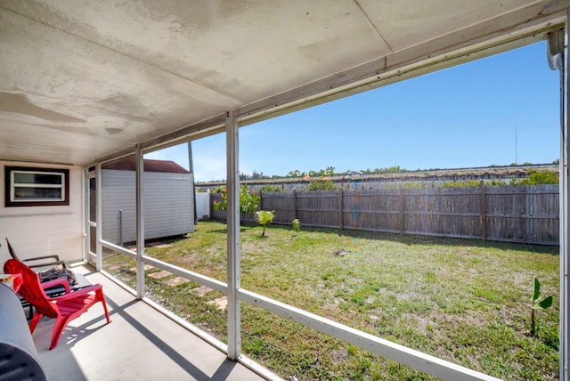7938 Ridgewood Dr, Lake Worth, FL 33467 - view of yard with an outbuilding, a fenced backyard, and a storage unit