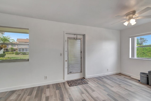 97 Saxony C, Delray Beach, FL 33484 - interior space featuring baseboards, ceiling fan, and wood finished floors