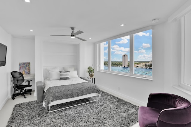 bedroom featuring baseboards, ceiling fan, and recessed lighting