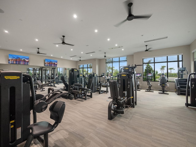 workout area with light carpet, recessed lighting, and ceiling fan