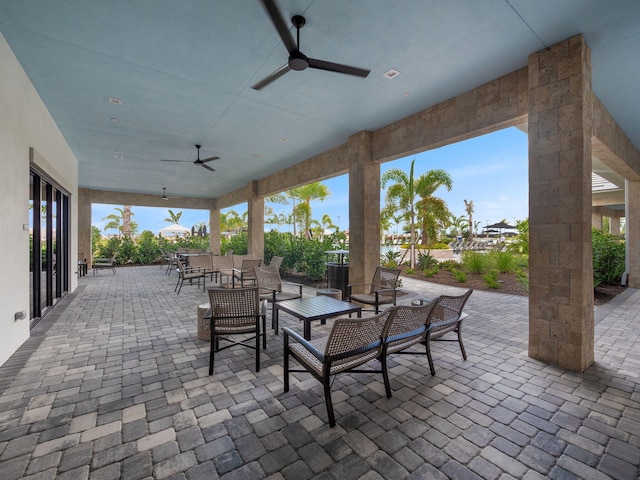 view of patio featuring ceiling fan