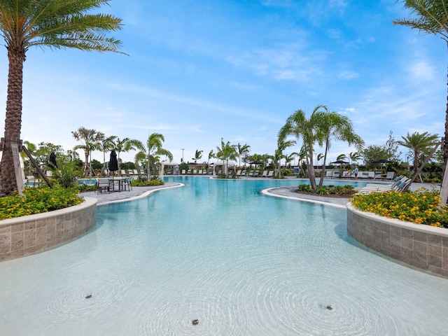 community pool with a patio