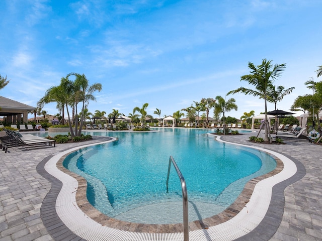pool featuring a patio area