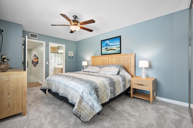 3531 SW Sunset Trace Cir, Palm City, FL 34990 - bedroom with carpet flooring, baseboards, and visible vents