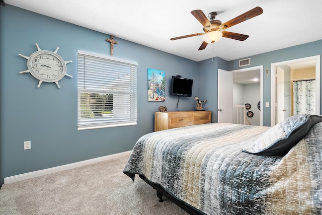 3531 SW Sunset Trace Cir, Palm City, FL 34990 - bedroom with ceiling fan, visible vents, baseboards, and carpet
