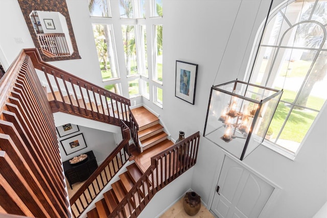 staircase featuring a wealth of natural light