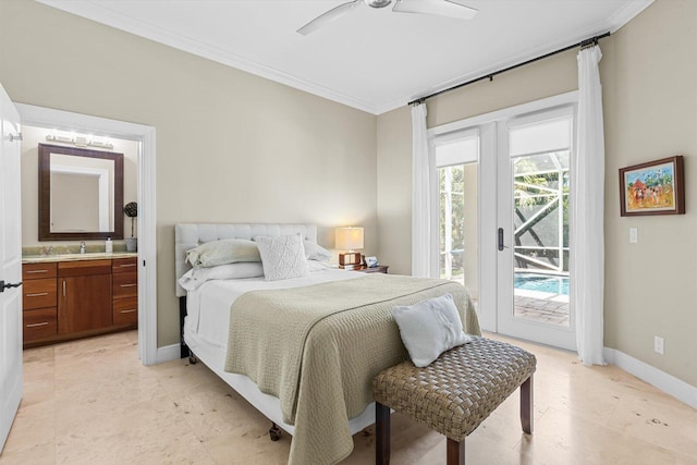 bedroom with ceiling fan, crown molding, access to exterior, baseboards, and ensuite bathroom