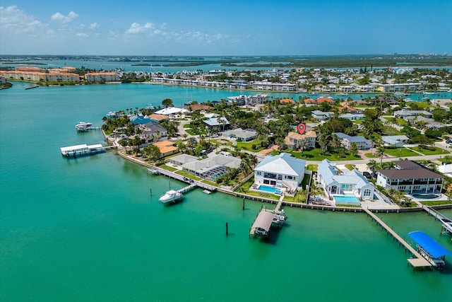 bird's eye view featuring a residential view and a water view