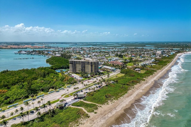 bird's eye view with a view of the beach and a water view