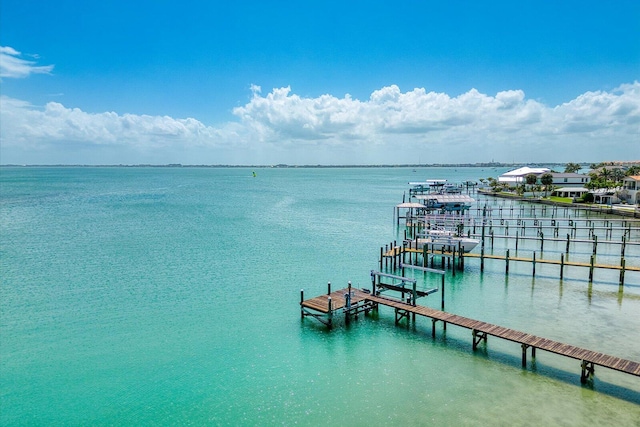 exterior space with a water view and boat lift