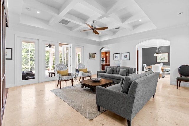 living room featuring visible vents, coffered ceiling, arched walkways, beam ceiling, and a ceiling fan