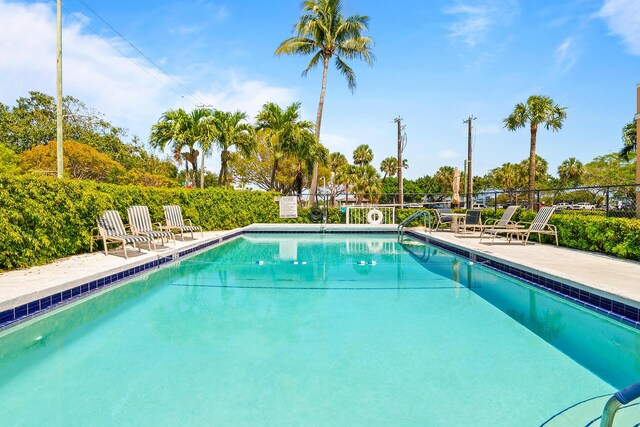31 S Golfview Rd # 11, Lake Worth Beach, FL 33460 - community pool with a patio and fence