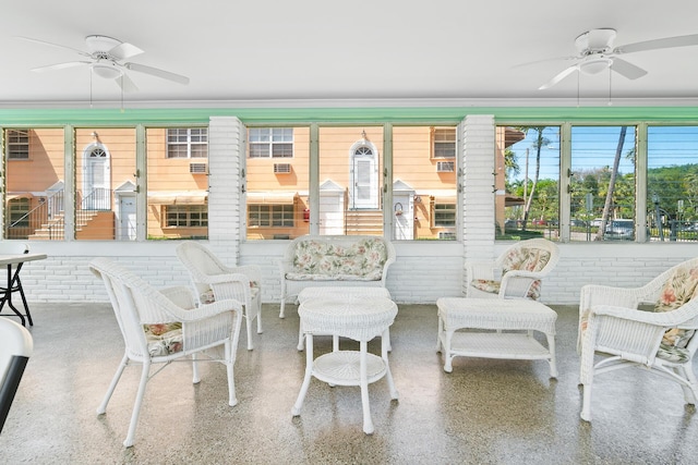 31 S Golfview Rd # 11, Lake Worth Beach, FL 33460 - sunroom / solarium with a ceiling fan, brick wall, and ornamental molding
