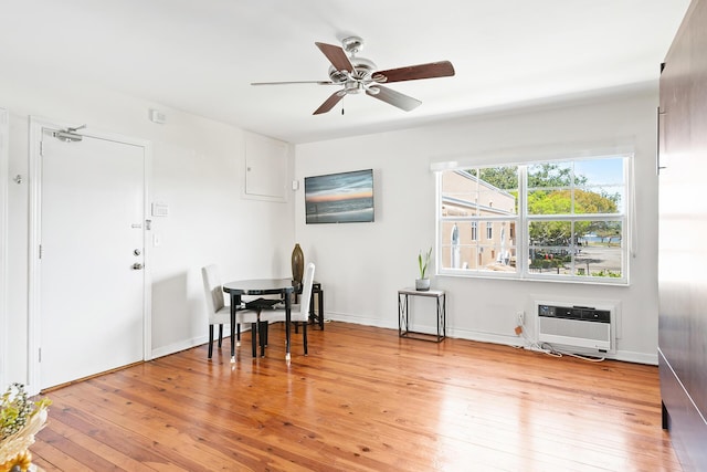 31 S Golfview Rd # 11, Lake Worth Beach, FL 33460 - dining room with ceiling fan, light wood-type flooring, and a wall mounted air conditioner