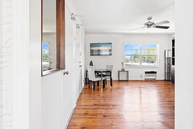 31 S Golfview Rd # 11, Lake Worth Beach, FL 33460 - interior space with heating unit, baseboards, and hardwood / wood-style floors