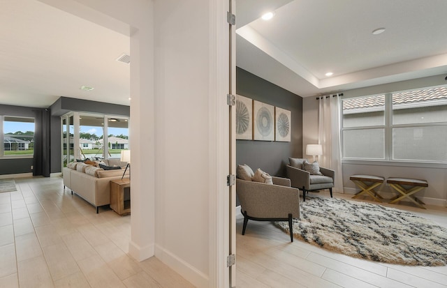 10822 Stellar Cir Unit Renown 26, Palm Beach Gardens, FL 33412 - living room with recessed lighting, baseboards, and light wood-style floors