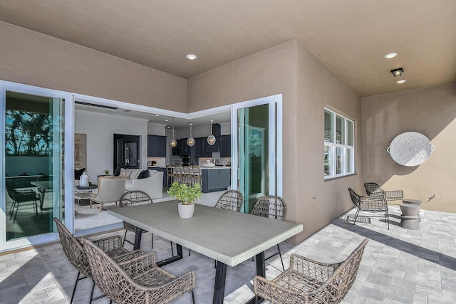 10822 Stellar Cir Unit Renown 26, Palm Beach Gardens, FL 33412 - view of patio with outdoor dining space