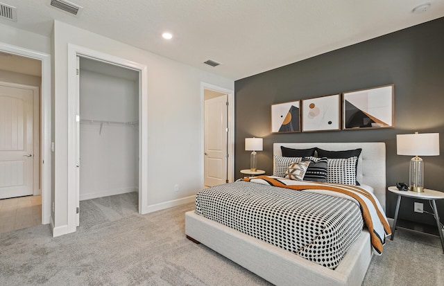10822 Stellar Cir Unit Renown 26, Palm Beach Gardens, FL 33412 - bedroom with carpet, baseboards, recessed lighting, a spacious closet, and a closet