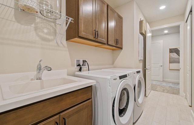 10822 Stellar Cir Unit Renown 26, Palm Beach Gardens, FL 33412 - washroom featuring cabinet space, separate washer and dryer, and recessed lighting
