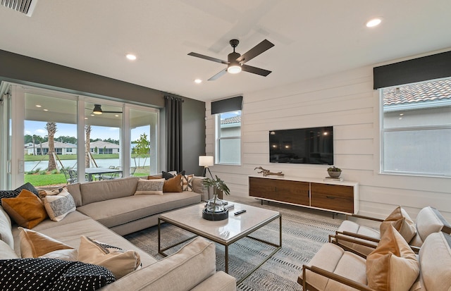 10822 Stellar Cir Unit Renown 26, Palm Beach Gardens, FL 33412 - living area with a ceiling fan and recessed lighting