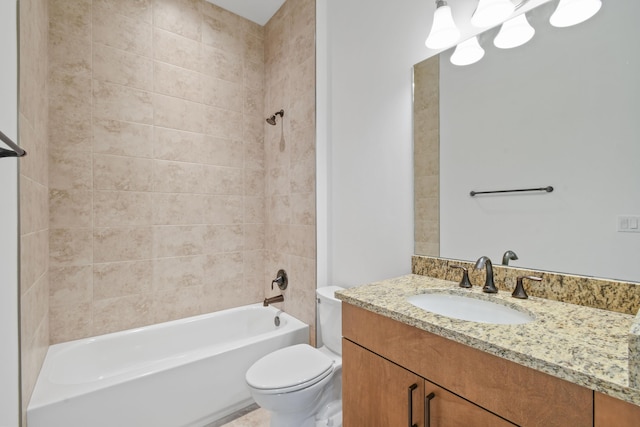 bathroom featuring toilet, bathing tub / shower combination, and vanity