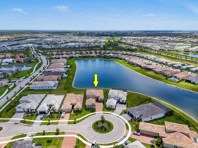 aerial view with a residential view and a water view