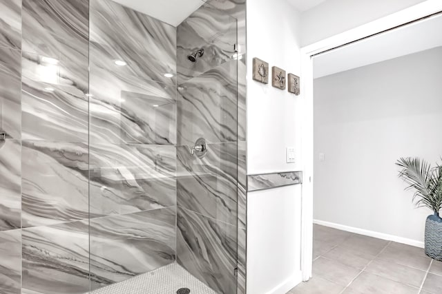 20 Lexington Ln W Unit B, Palm Beach Gardens, FL 33418 - bathroom featuring a marble finish shower and tile patterned flooring