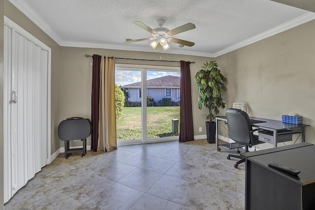 office space with ornamental molding, baseboards, a ceiling fan, and a textured ceiling