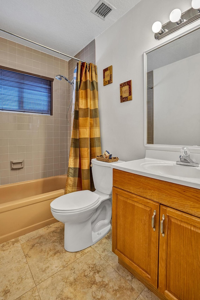 full bathroom featuring vanity, tile patterned floors, toilet, shower / bathtub combination with curtain, and visible vents