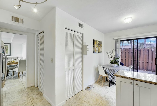 5337 Fountains Dr S, Lake Worth, FL 33467 - dining space with visible vents, marble finish floor, and baseboards