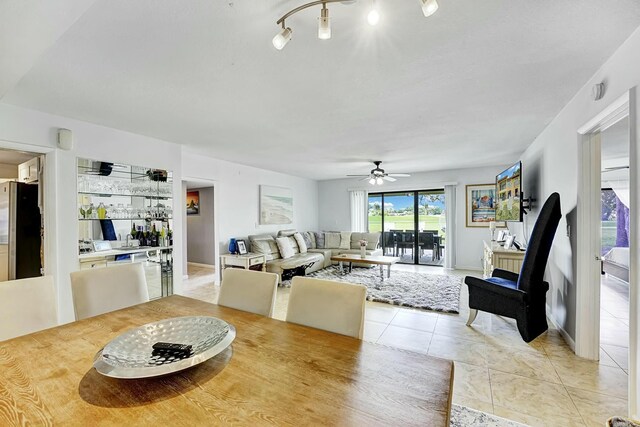 5337 Fountains Dr S, Lake Worth, FL 33467 - living area featuring light tile patterned flooring and ceiling fan