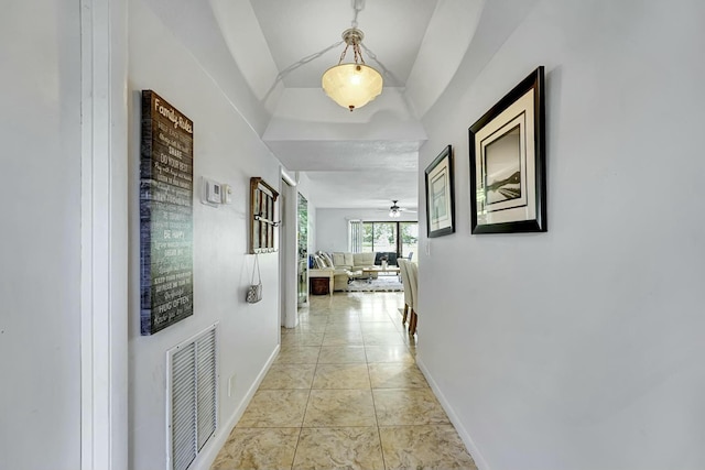 5337 Fountains Dr S, Lake Worth, FL 33467 - hallway with vaulted ceiling, visible vents, and baseboards