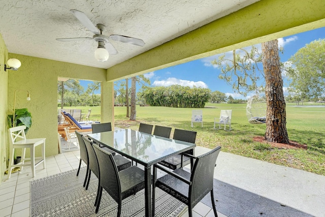 5337 Fountains Dr S, Lake Worth, FL 33467 - view of patio featuring a ceiling fan and outdoor dining area