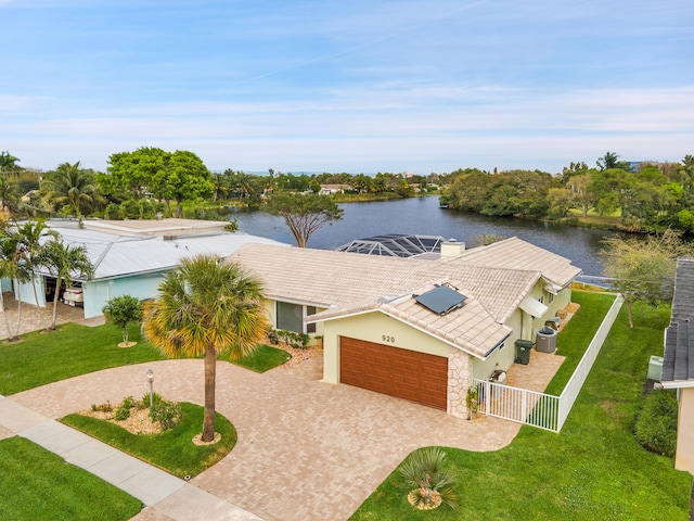 drone / aerial view with a water view