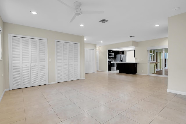 unfurnished living room with recessed lighting, visible vents, a ceiling fan, and light tile patterned floors