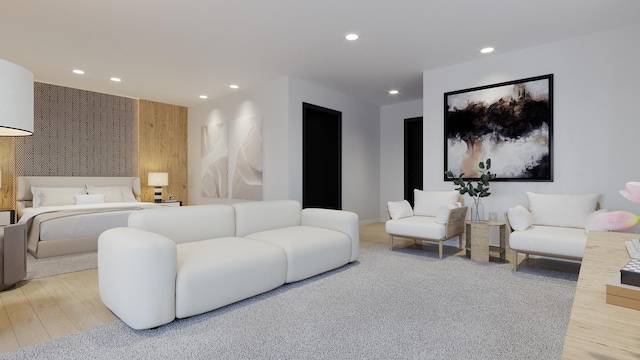bedroom with light wood-style flooring and recessed lighting