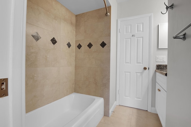 full bathroom featuring baseboards, vanity, tile patterned floors, and shower / tub combination