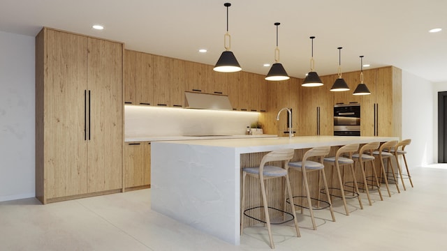 kitchen with modern cabinets, double oven, exhaust hood, and recessed lighting