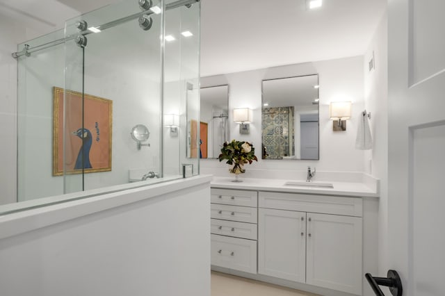 1180 S Ocean Blvd Unit 11D, Boca Raton, FL 33432 - full bathroom featuring a stall shower and vanity