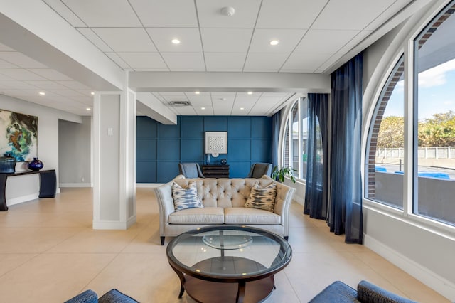 1180 S Ocean Blvd Unit 11D, Boca Raton, FL 33432 - living room featuring a drop ceiling, baseboards, light tile patterned floors, and recessed lighting