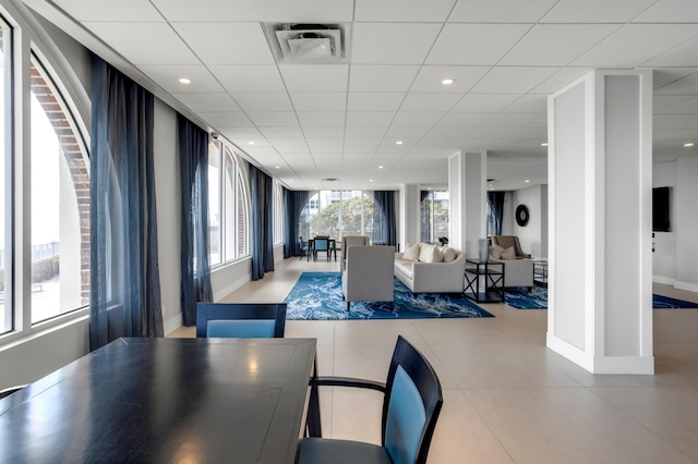 1180 S Ocean Blvd Unit 11D, Boca Raton, FL 33432 - dining room with baseboards, tile patterned floors, recessed lighting, and a drop ceiling
