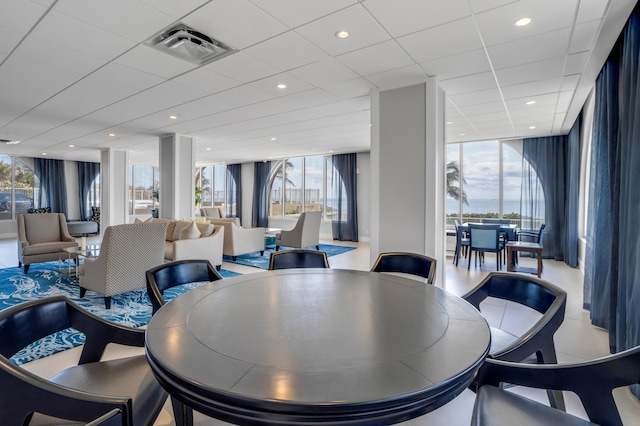 1180 S Ocean Blvd Unit 11D, Boca Raton, FL 33432 - dining space with floor to ceiling windows, healthy amount of natural light, recessed lighting, and a paneled ceiling