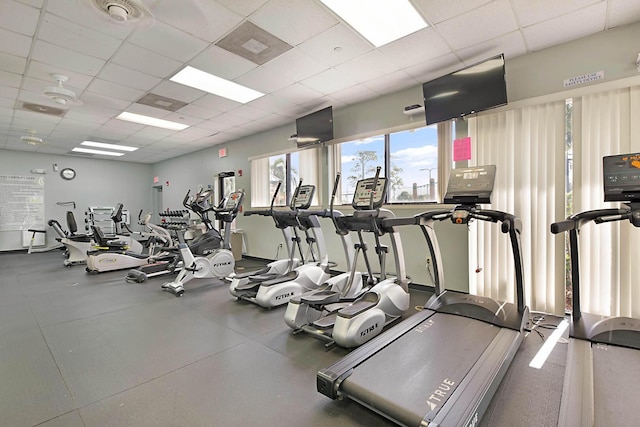gym featuring visible vents and a drop ceiling