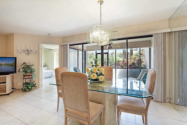 dining area with light tile patterned floors and a notable chandelier