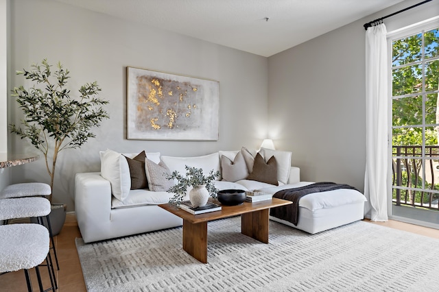 living area featuring tile patterned floors